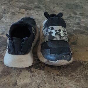 2 Pairs Under Armour Kids Black and Camouflage Sneakers. 2 Pairs Size 13.